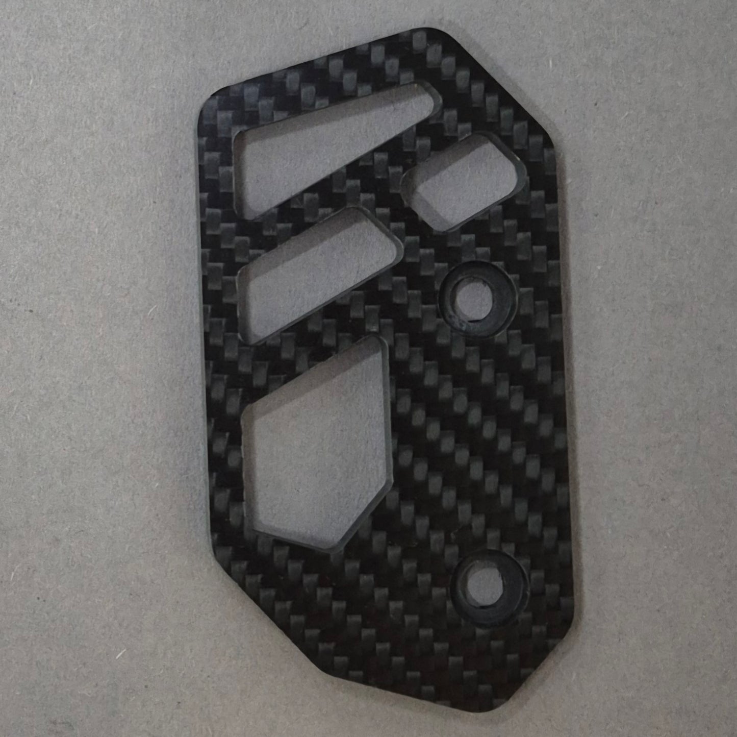 REAR BRAKE COVER | CARBON