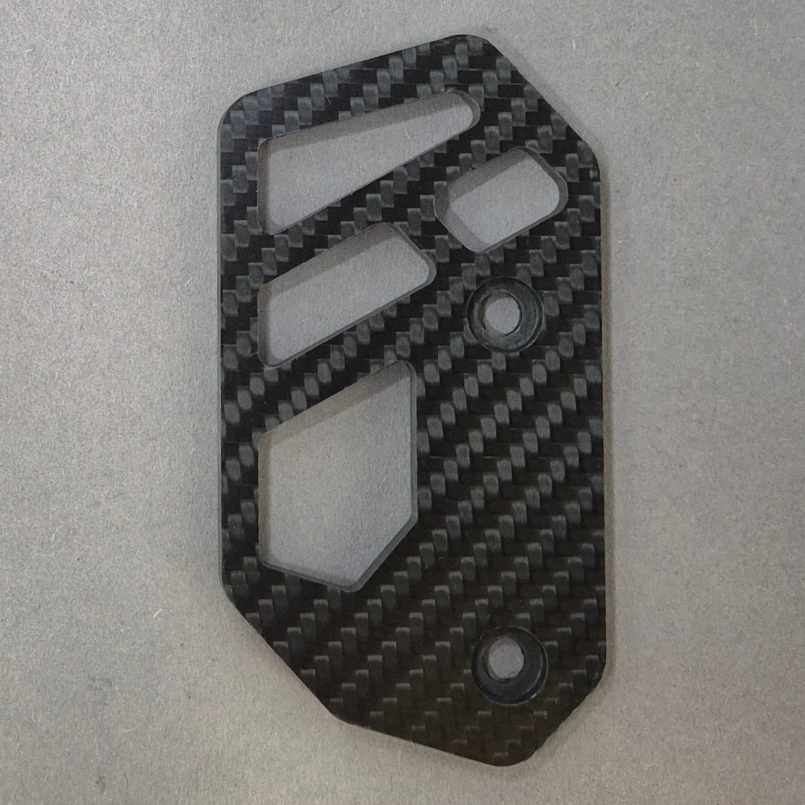 REAR BRAKE COVER | CARBON